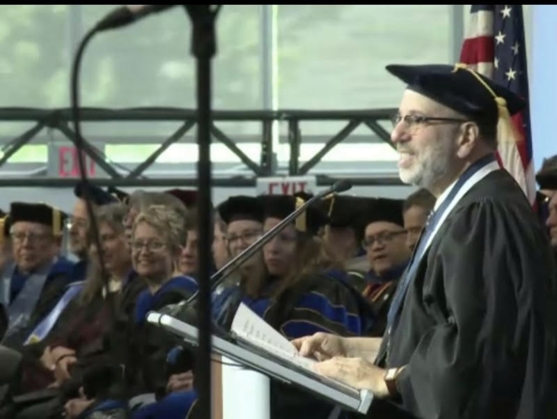Larry Hirschhorn delivering the commencement address at Ithaca College
